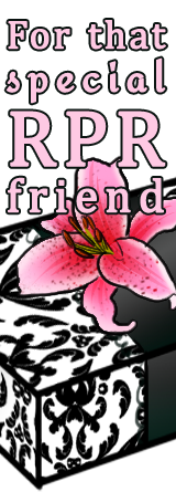 A gift in fancy black and white wrapping paper, wrapped with a black ribbon and adorned with a pink stargazer lily. Text reads: For that special RPR friend